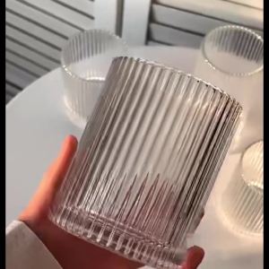 Striped glass cup made of simple and transparent material suitable for juice water and iced coffee cup drinking utensil