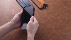 SUTENI Smooth Material Phone Case Wrist Strap Ring Buckle Faux Leather Card Holder Stand For iPhone 17 Pro Max 16 Plus 15 14 13