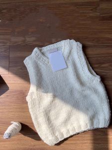 สไตล์เกาหลี สีขาว ถักไหมพรมคอกลม เสื้อกั๊ก ผู้หญิง ฤดูใบไม้ผลิ ฤดูใบไม้ร่วง เลเยอร์ หลวม สไตล์ขี้เกียจ แขนกุด เสื้อท่อนบน