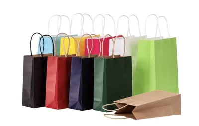 Paper bag with handle in various colors for shopping and gifting.