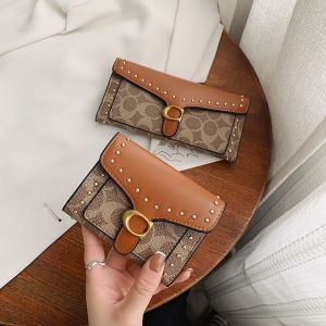 กระเป๋าสตางค์หนัง PU ทรงสั้น กระเป๋าสตางค์ผู้หญิง กระเป๋าสตางค์แบบพับได้ กระเป๋าสตางค์แบบมีช่องใส่บัตรหลายช่อง กระเป๋าสตางค์แบบอเนกประสงค์ กระเป๋าสตางค์แฟชั่น