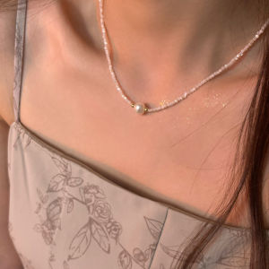 Natural Pearl Necklace Short Fashion Gentle Choker Clavicle Chain with adjustable gold chain and single pearl pendant.