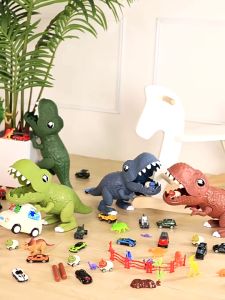 Quà tặng cho bé giáng sinh noel Đồ chơi mô hình cầu trượt khủng long nuốt xe 38 chi tiết cao cấp Bãi đậu xe khủng long bạo chúa 2 ván trượt