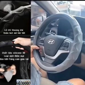 Bọc vô lăng da phối cacbon cao cấp - bọc xe con - bọc xe 4-16 chỗ