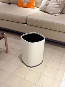 Lidless Trash Can: 8L/12L/15L (4 Colors)\\n\\n Introduction to Our Lidless Trash Can\\n\\nWelcome to our store, dedicated to providing top-quality products at competitive prices. Today, we're excited to introduce our lidless trash can, available in 8L, 12L, and 15L sizes, and four stylish colors. Designed for simplicity and convenience, our large capacity trash cans are perfect for any household. We offer multiple color options, so you can choose the one that best complements your living room decor.\\n\\n How to Choose the Right Size for Your Household\\n\\nWhen selecting a trash can, consider the size of your household and the amount of waste you generate daily. For smaller households or those with limited space, the 8L option may be sufficient. However, if you have a larger family or produce more waste, the 12L or 15L sizes might be better suited for your needs.\\n\\n Large Capacity Trash Can Options\\n\\nOur large capacity trash cans come in three sizes: 8L, 12L, and 15L. Each size is designed to accommodate various household waste management needs. Choose the size that best fits your lifestyle and living space.\\n\\n Simple Household Trash Can Benefits\\n\\nSimple household trash cans offer several advantages:\\n\\n- Easy installation and maintenance\\n- Compact design that maximizes storage space\\n- A wide range of color options to match your home decor\\n- Durable construction that withstands daily use\\n\\n How to Use Our Lidless Trash Can\\n\\nUsing our lidless trash can is straightforward. Simply place it in your desired location, such as the living room, kitchen, or bathroom, and start disposing of your waste. For optimal performance, regularly empty and clean the trash can to maintain hygiene and prevent unpleasant odors.\\n\\n Easy Installation & Maintenance\\n\\nOur lidless trash can is designed for easy installation and maintenance. Simply place it in your desired location and start using it. To clean, empty the trash can and wipe it down with a damp cloth. For tougher stains, use a mild detergent solution.\\n\\n Maximizing Storage Space in Your Living Room\\n\\nWith its compact design, our lidless trash can helps maximize storage space in your living room. Place it near a wall or behind furniture to keep it out of sight while still easily accessible.\\n\\n Why Choose Our Store for Your Trash Can Needs\\n\\nAt our store, we prioritize customer satisfaction and strive to provide the best possible shopping experience. Here are some reasons why you should choose us for your lidless trash can needs:\\n\\n- Competitive pricing and discounts\\n- Direct sales, distributors, and wholesale options\\n- A wide range of color options to suit any home decor\\n- High-quality products that withstand daily use\\n\\n Competitive Pricing & Discounts\\n\\nWe offer competitive pricing and frequent discounts to help you save money on our lidless trash cans. Keep an eye out for special promotions and subscribe to our newsletter to stay informed about upcoming deals.\\n\\n Direct Sales/Distributors/Wholesale Options\\n\\nIn addition to retail sales, we offer direct sales, distributor, and wholesale options for businesses and organizations. Contact us for more information about our wholesale pricing and bulk order options.\\n\\n Frequently Asked Questions\\n\\n Product Defects & Returns Policy\\n\\nIf you receive a defective product, please contact us immediately. We will work with you to resolve the issue and ensure your satisfaction. Our returns policy allows for returns within 30 days of purchase, subject to certain conditions.\\n\\n Business Hours & Contact Information\\n\\nOur business hours are 8:30 a.m. to 6:00 p.m. Monday through Friday. You can reach us by phone at +1 (555) 123-4567 or via email at info@lidlesstrashcanstore.com. We look forward to serving you!\n}