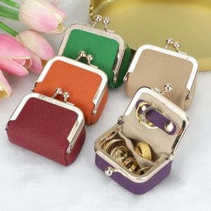 กระเป๋าเงินใส่เหรียญขนาดเล็กหนังแท้ Smart King กระเป๋าใส่เศษเหรียญล็อคสีทึบ Kiss กระเป๋าเก็บของขนาดเล็กสไตล์ลำลองสำหรับผู้หญิง1894