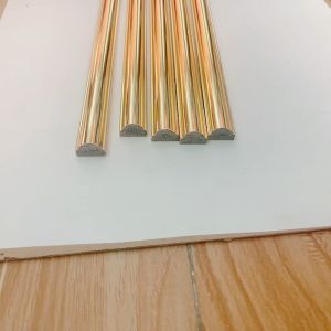 Phào chỉ tường nẹp chỉ nhựa ps 2cm vàng bóng