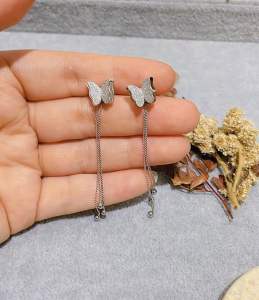 Anting kupukupu jurai titanium