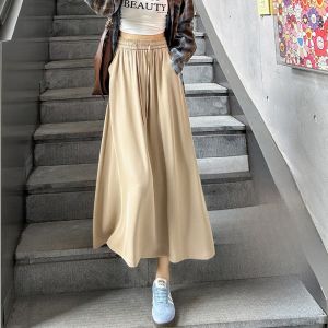 JIANGLU | Váy chữ A cạp cao màu đen dài đến giữa bắp chân cho nữ mùa thu 2024 Váy công sở xếp nếp phong cách mới Váy chữ A