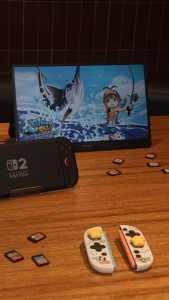 Grip sạc chữ V hít nam châm IINE có đèn báo trạng thái sạc cho Joy-con Nintendo Switch 2