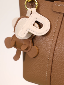PAZZION 8810 Haley Leather Charmed Bucket Bag