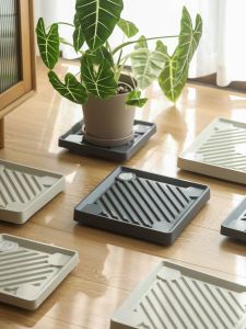 แท่นพื้นกระถางพลาสติกหนาสำหรับต้นไม้ขนาดใหญ่ ระบายอากาศได้ดี มีล้อเคลื่อนที่ 4 ล้อ สำหรับตกแต่งสวนและสวนในบ้าน