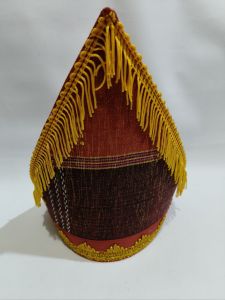 Topi sadum aksesoris pria adat Batak toba