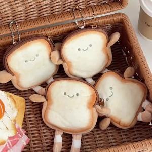 Jualan hebat [ Penghantaran dari China ]2025 Dompet Syiling Roti Bakar Kartun Comel Baharu Kreatif Boneka Mewah Loket Syiling Fon Telinga Beg Simpanan Kad Kunci Beg Kecil