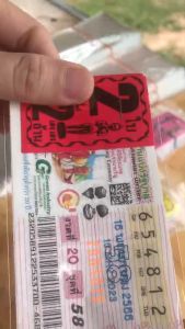 ล็อตเตอรี่หัวสี 100 ใบ ชุด 2 ใบ 12 ล้าน โบติดสลากกินแบ่งรัฐบาล ใบปะหน้าสลากกินแบ่งรัฐบาล tag lottory