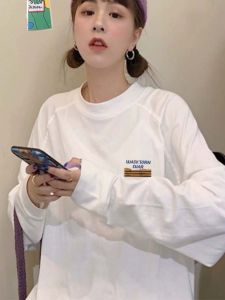 เสื้อยืดแขนยาวผ้าฝ้ายแท้สีขาว ทรงหลวม สำหรับผู้หญิง ฤดูใบไม้ร่วง/ฤดูหนาว เสื้อชั้นในแบบมีขนแกะ เสื้อเชิ้ตทรงหลวม เสื้อผ้าทำงาน