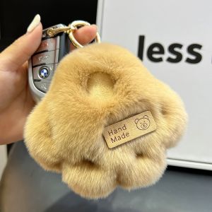 น่ารัก พวงกุญแจรถอุ้งเท้าหมีของเล่นตุ๊กตาระดับไฮเอนด์ < Ne2> กระเป๋าหนังสือตุ๊กตาแขวนเครื่องประดับของขวัญวันเกิดน่ารักขนกระต่ายจริง