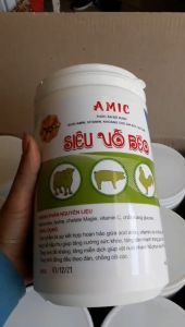 SIÊU VỖ BÉO AMIC Dùng cho Gia Súc Gia Cầm Bung Đùi Nở Vai Mượt Long Nặng Ký - Lon 1Kg