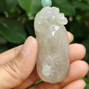 High Quality Brownish Yellow Icy Translucent Natural Type A Jadeite Jade crafted with Monkey as Pendant certificate weighs 31.67 grams measurement 53 * 23.6 * 13 mm (pendant295)