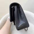 (Pre-loved) Chanel Medium Classic Flap CF in Black Caviar and SHW (Model: A01112). 