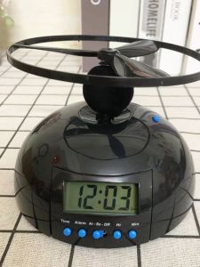 Creative Flying Alarm Clock Silent Large Bell Bedroom Bedside Clock Novelty Plastic Home Decor Clocks from Guangdong China