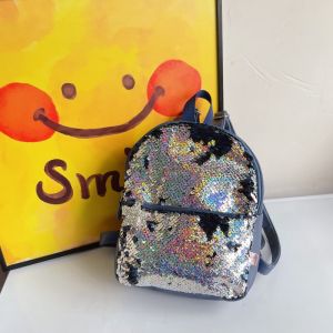 กระเป๋าเป้สะพายหลังผ้าไนลอนสะท้อนแสงสีสันสดใสสำหรับเด็กผู้หญิง กระเป๋าสะพายไหล่แบบมีซิปแบบลำลองสำหรับการเดินทางในวันหยุด สไตล์แฟชั่น