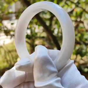 The Moonlight Light Bangle - Light Lavender Natural Type A Jadeite Jade crafted as Peace bracelet Bangle Certificate weigh 56.46 grams Measurements: Width 13mm Thickness 8.1mm Inner Diameter 54.6mm (Bangle1)