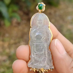 High Quality Light Green and Green Cabochon Icy Translucent Natural Type A Jadeite Jade crafted as Guan Gong set on 18k Gold as Pendant certificate weighs 8.07 grams measurement 57.2 * 22.7 * 5.8 mm (18kp46)