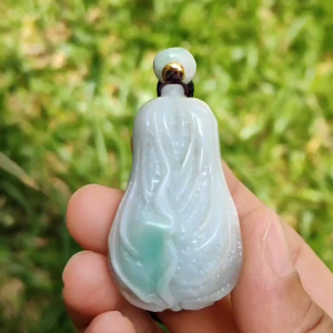 Crafted as Chinese cabbage with patches of light green Natural Type A Jadeite Pendant Necklace with QIC approved labs certificate weigh 31.92 grams 46.8 * 27.3 * 18 mm symbols of Boosts wealth purity and good weather suitable for daily wear