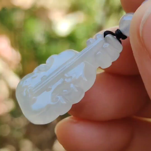 Super Rare Pure White Semi Icy Natural Type A Jadeite Jade crafted as Violin Pendant certificate weighs 3.92 grams measurement 27.7 * 15 * 5.3 mm (pendant256)