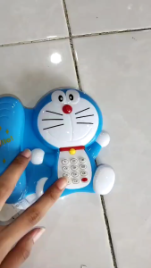 Mainan Edukasi Anak Telephone Doraemon Music 1713D | Mainan Anak Murah Meriah Dan Terbaru Bisa Bunyi Suara Dan Ada Lampu Di Bagian Atas | Telepone Rumah Karakter Doraemon Menggunakan Baterai Biasa | Mainan Bayi Musik Teelphone Doraemon Yang Lucu