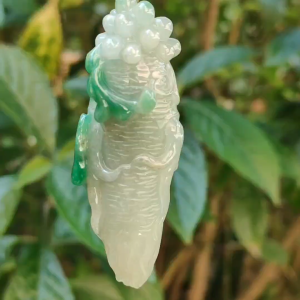 With Green and Light Green Ginseng Ruyi Natural Type A Jadeite pendant come with certificate weight 40.59 grams 72.30 * 24.80 * 20 mm meaning Auspicious representing good luck happiness joy and wealth boosting you wearing it (pendant97)