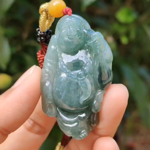 Green Natural Type A Jadeite Jade crafted with Milo Buddha as Pendant certificate weigh 24.11 grams measurement 51.2 * 31 * 10.5 mm (pendant239)