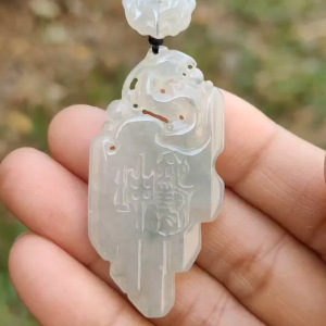Icy Translucent Natural Type A Jadeite Jade beautifully crafted with old school dragon as pendant certificate weighs 14.63 grams (pendant246)
