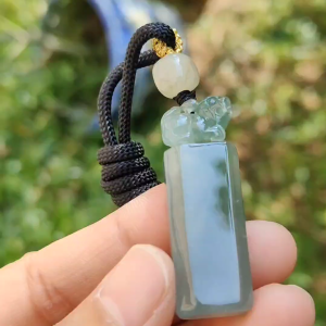 An Excellent Piece of Green Natural Type A Jadeite Pendant Necklace or Stamp crafted with Pixiu boosting Incoming Money and power with certificate weigh 13.16 grams 41.2 * 13.6 * 8.7 mm (pendant137)