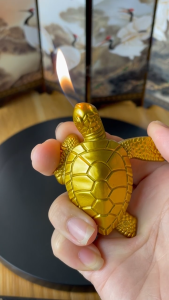 HCM Bật Lửa Xài Gas Hình Con Rùa Vàng