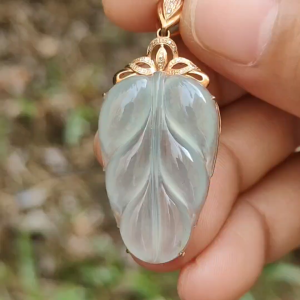 Premium Quality Icy Translucent Light Green Hue Natural Type A Jadeite Jade crafted as Leaf set on 18k Gold as Pendant certificate weighs 5.07 grams measurement 40.5 * 18 * 7.5 mm (18kp42)