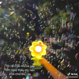 Máy bong bóng tự động hình cây hoa hướng dương nhảy múa đồ chơi máy bắn bóng cầm tay phát sáng bảy màu