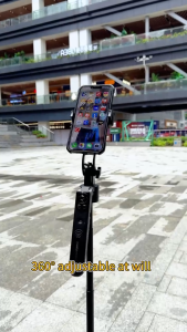 Xundd Extendable Auto Face Tracking Tripod 360°Rotating Four-Legged Stand Phone Holder