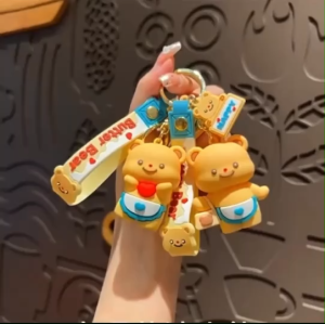 จี้หมีเนย พวงกุญแจหมีเนยการ์ตูนพีวีซี เครื่องประดับแขวนน่ารักกระเป๋าเป้สะพายหลังพวงกุญแจอุปกรณ์เสริมกระเป๋า