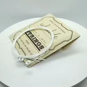 (พร้อมส่ง) สายอูคูเลเล่ 4 เส้น/เซ็ต สายไนลอนสีขาว Ukulele Strings สำหรับอูคูเลเล่ขนาด21/23/26นิ้ว แถมฟรีปิ๊ก+ที่เก็บปิ๊ก