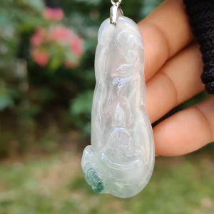 Icy variety Translucent with green Natural Type A Jadeite Pendant Necklace crafted as the faceless buddha with symbols of Holy and blessed blessings of wealth prosperity and happiness with certificate weigh 11.02 grams 49.9 * 19.9 * 7 mm (pendant34)