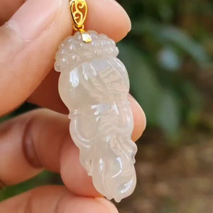 Yellow Icy Translucent Natural Type A Jadeite Jade crafted with shape of Ginseng as Pendant set with 18k gold clasp certificate weighs 4.85 grams (18kp39)