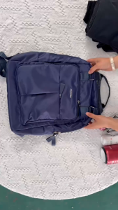 SPS BAGS#1199 Fashionable multi-pocket nylon 15inches backpack for Women with multiple compartments including double-zippered main sections and side pockets.