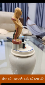 Bình rót rịu tự động vòi inox tiểu đồng tử bằng sứ chất lượng cao  2025 miễn phí ship