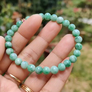 Light Spicy Green Natural Type A Jadeite Jade crafted with 6.6mm * 28 beads as bracelet QIC lab approved certificate weigh 13.41 grams (bracelet20)