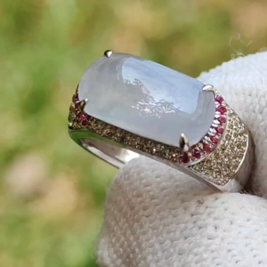 Premium Quality Light Lavender Natural Type A Jadeite Jade crafted as Cabochon 12.8 * 6.7 * 2.8mm set on 18k Gold with Ruby and Diamonds as Ring Finger Size 15.5 mm certificate weigh 3.22 grams (18kring23)