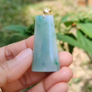 Light Green with Green Patches Natural Type A Jadeite Jade Crafted with Nothing as a pendant attached with 18k gold clasp certificate weigh 11.24 grams measurement 40.2 * 21 * 7.1 mm (18kp21)