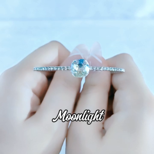SO SEOUL Carina Cushion Moonlight/Light Sapphire Shimmer Swarovski® Crystal Spiral Open-End Bangle