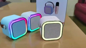 ( TẶNG KÈM 2 MIC HÁT ) Loa bluetooth K12 Không Dây mini Kèm 2 Micro Thiết Kế Nhỏ Gọn Tiện Dụng Thay Đổi Giọng Dễ Sử Dụng